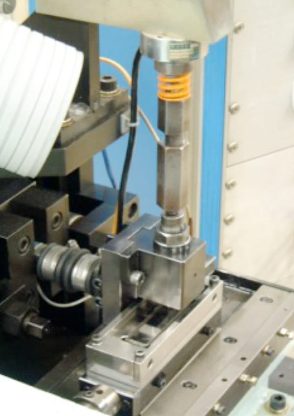 Reciprocal friction testing machine